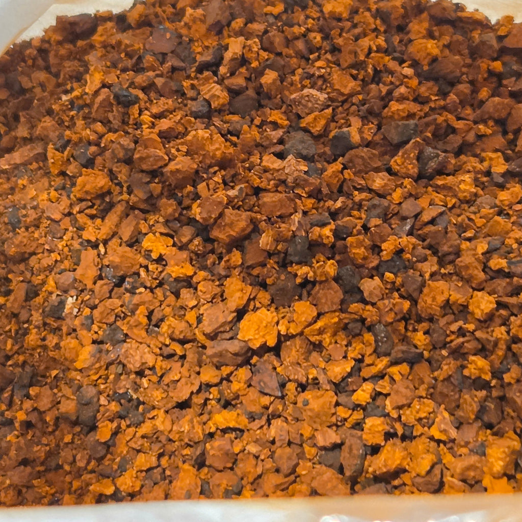 A close up picture of ground Chaga mushrooms